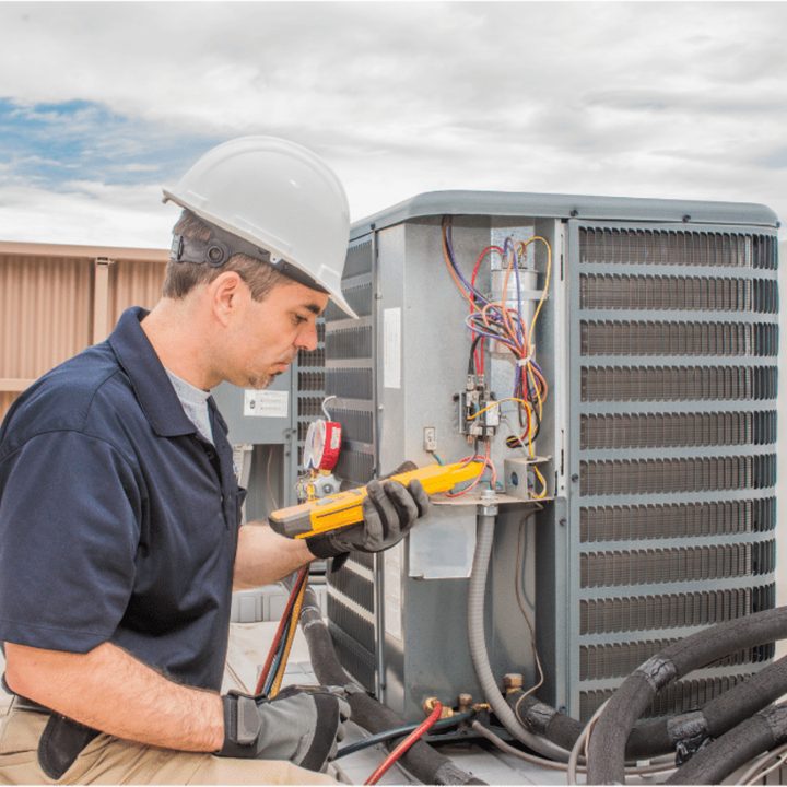 Whitby Duct Cleaning certified duct cleaning technician on a service call in Whitby, Ontario